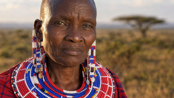 Image Upscaler sample: A Maasai elder's portrait upscaled, every glass bead, thread and skin line crisply rebuilt.