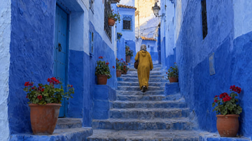 Images to Reel sample: Photos turned into a reel: a blue Chefchaouen alley, then golden Saharan dunes.
