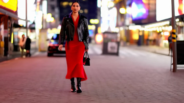 Topaz Video sample: A walk down a neon-lit street at night, resolved without smearing
