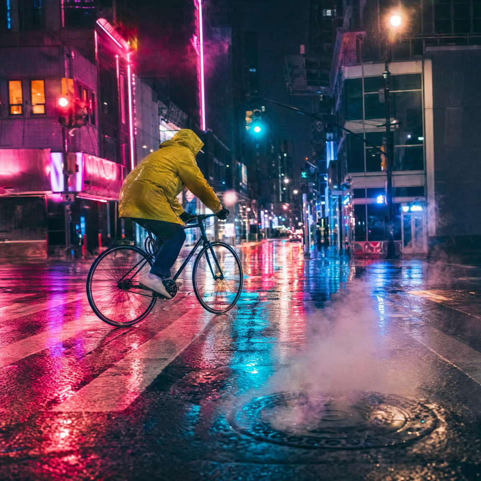 A plain street edited into a neon rain scene